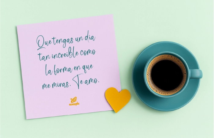 Tarjeta rosa con frase romántica junto a una taza de café y un corazón amarillo